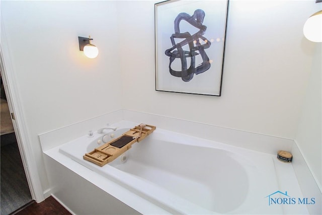 bathroom featuring a bath
