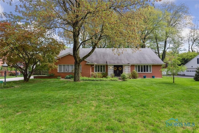 3448 Corey Rd, Toledo, OH 43615 - single story home with a front lawn