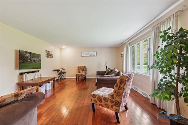 3448 Corey Rd, Toledo, OH 43615 - living room with hardwood / wood-style floors and baseboards