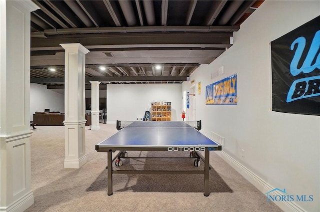 recreation room with decorative columns, carpet flooring, and baseboards