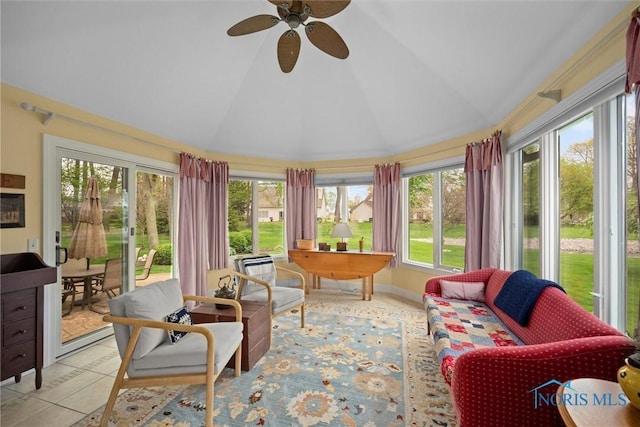 sunroom / solarium with high vaulted ceiling