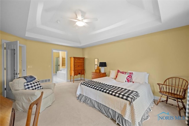 2284 Big Hickory Run, Sylvania, OH 43560 - bedroom with a tray ceiling, baseboards, ensuite bath, ceiling fan, and visible vents