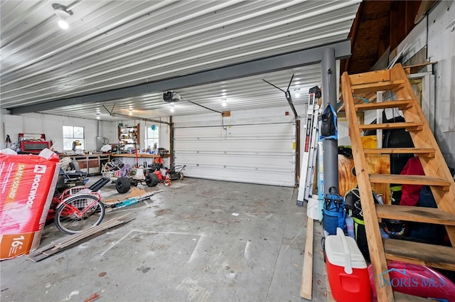 garage featuring a garage door opener