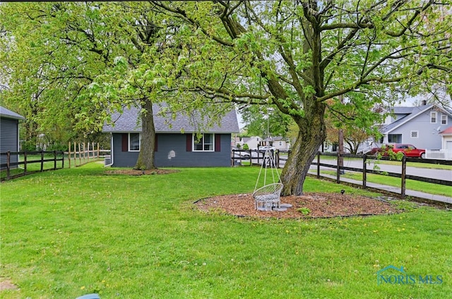 view of yard with fence