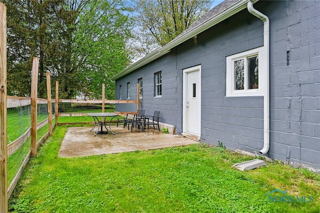 view of yard with a patio and fence