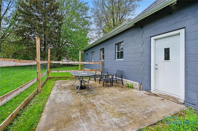 view of patio with fence