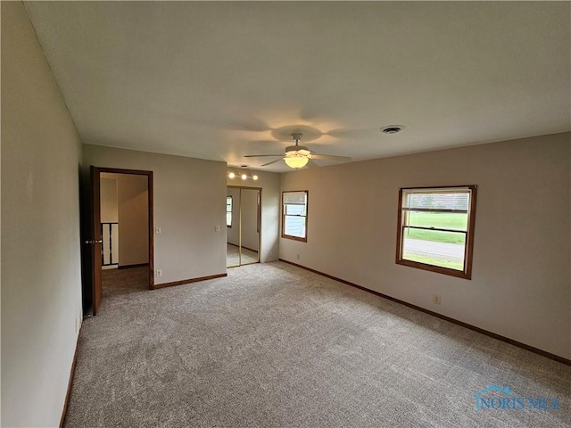 23675 W State Route 51, Genoa, OH 43430 - empty room with light carpet, baseboards, and a ceiling fan