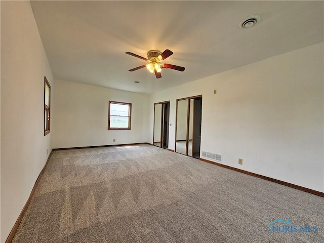 23675 W State Route 51, Genoa, OH 43430 - spare room featuring ceiling fan, light carpet, and baseboards