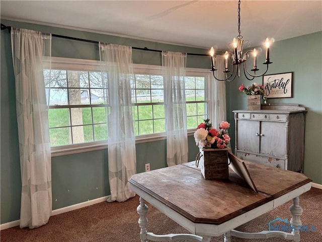 12982 State Route 34, Bryan, OH 43506 - dining space with carpet flooring, a chandelier, and baseboards