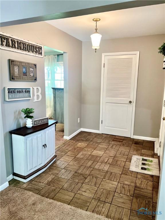 12982 State Route 34, Bryan, OH 43506 - foyer featuring baseboards
