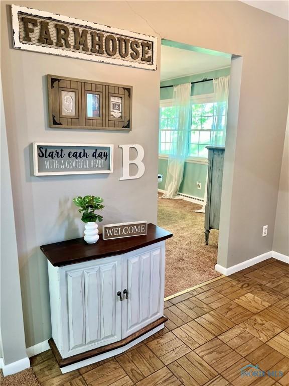 12982 State Route 34, Bryan, OH 43506 - hall with baseboards and carpet floors