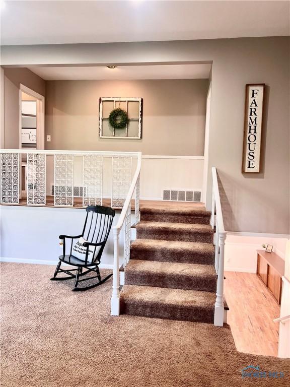 12982 State Route 34, Bryan, OH 43506 - staircase with carpet floors