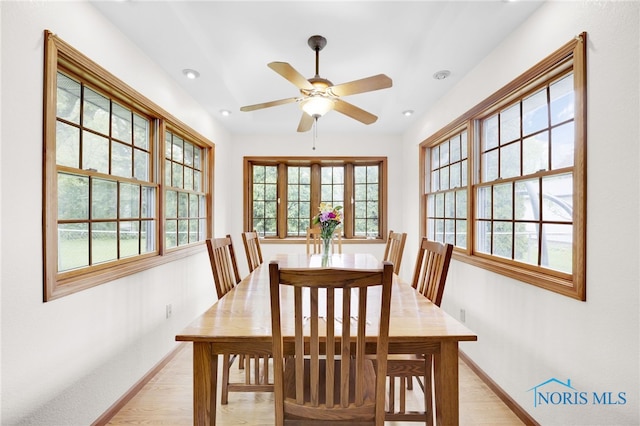dining space featuring baseboards, healthy amount of natural light, light wood-type flooring, and recessed lighting