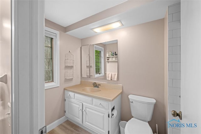 26101 Willowbend Rd, Perrysburg, OH 43551 - bathroom with toilet, vanity, and baseboards