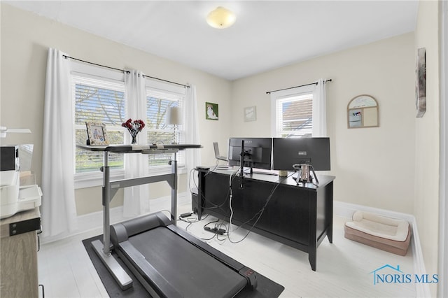 office area featuring baseboards
