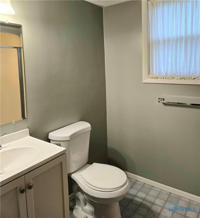 13941 Hannah Rd, Bowling Green, OH 43402 - half bath with toilet, baseboards, and vanity