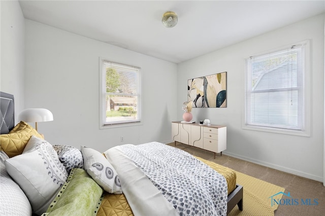 4410 Margrete Dr, Maumee, OH 43537 - bedroom featuring light colored carpet and baseboards