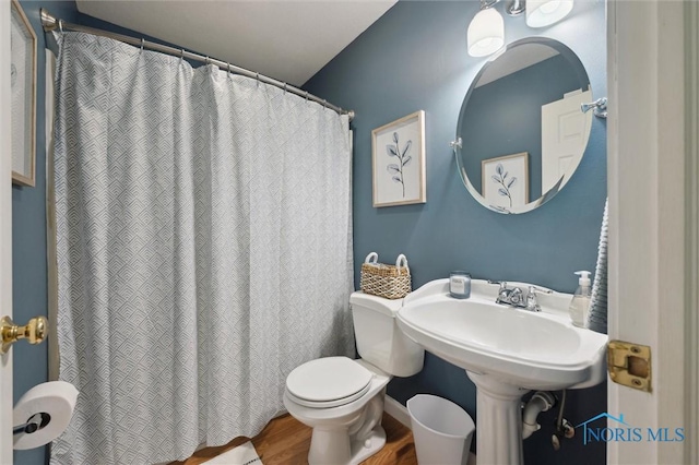 4410 Margrete Dr, Maumee, OH 43537 - bathroom featuring wood finished floors and toilet