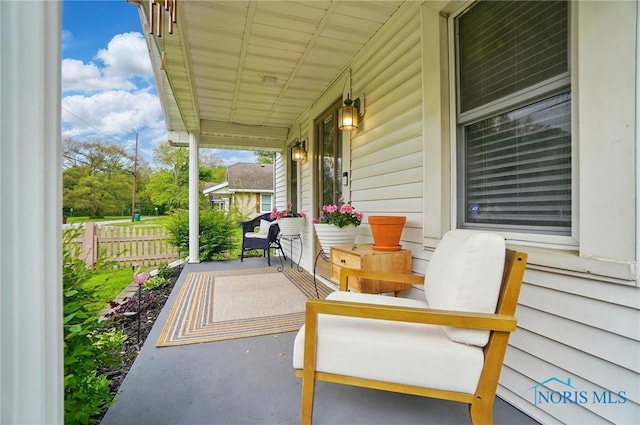 5036 Trellis Way, Sylvania, OH 43560 - view of patio with a porch and fence