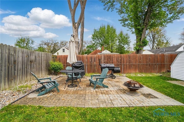 5036 Trellis Way, Sylvania, OH 43560 - view of patio featuring an outdoor fire pit and a fenced backyard