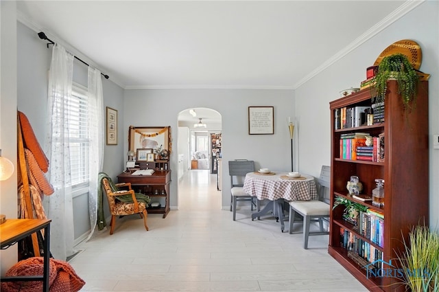 5036 Trellis Way, Sylvania, OH 43560 - living area with arched walkways, crown molding, and baseboards