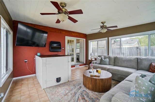 5036 Trellis Way, Sylvania, OH 43560 - living room featuring baseboards, light tile patterned floors, and ceiling fan
