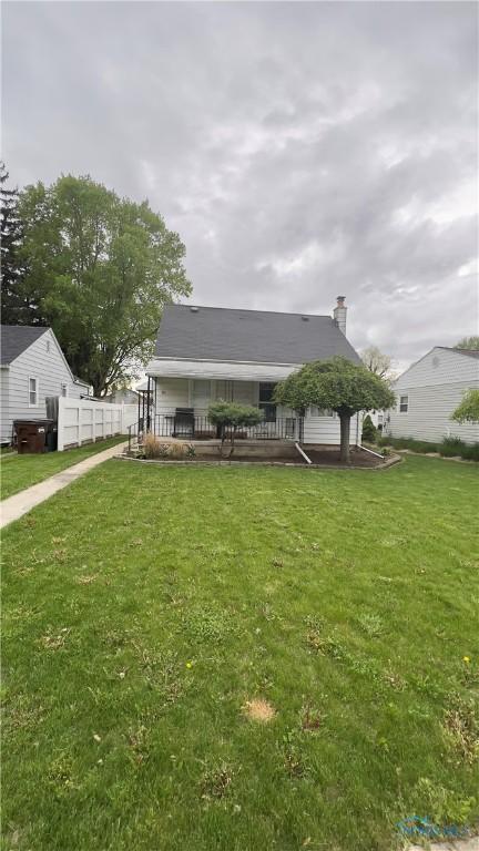 bungalow with a front lawn