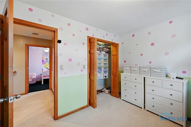 bedroom with light carpet