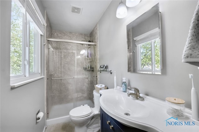 250 Southwood Dr, Perrysburg, OH 43551 - full bath featuring a shower stall, toilet, vanity, and visible vents