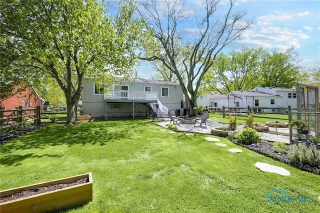 250 Southwood Dr, Perrysburg, OH 43551 - view of yard with fence, a patio, stairs, a deck, and a fire pit