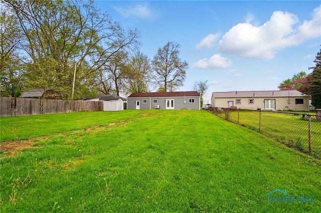 20161 Locust St, Weston, OH 43569 - view of yard featuring an outdoor structure, a shed, and a fenced backyard