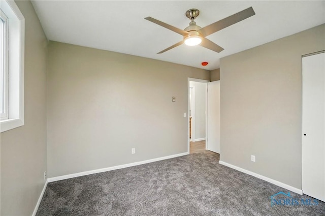 20161 Locust St, Weston, OH 43569 - unfurnished bedroom with baseboards, ceiling fan, and carpet