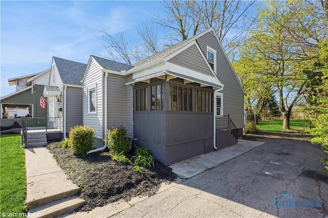 214 Meekison St, Napoleon, OH 43545 - bungalow-style house with a shingled roof