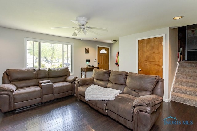 living room featuring ceiling fan, dark wood finished floors, stairs, recessed lighting, and baseboards