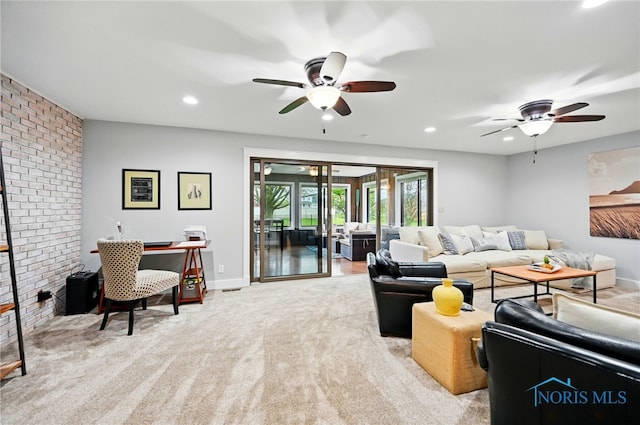 685 N Main St, Arlington, OH 45814 - carpeted living area featuring ceiling fan, recessed lighting, brick wall, and baseboards