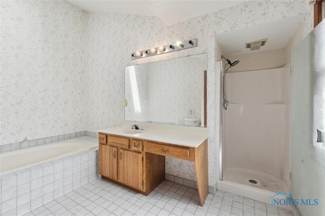 full bathroom with wallpapered walls, tile patterned flooring, a shower stall, vanity, and a garden tub
