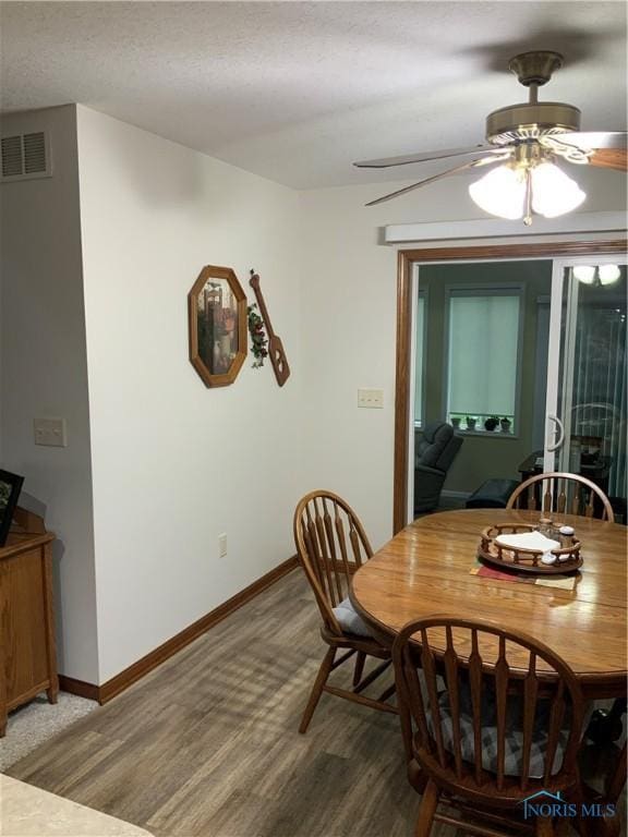 109 Rivers Edge Ln Unit C, Upper Sandusky, OH 43351 - dining area with ceiling fan, light wood finished floors, baseboards, and a textured ceiling