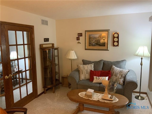 109 Rivers Edge Ln Unit C, Upper Sandusky, OH 43351 - living room featuring carpet and baseboards