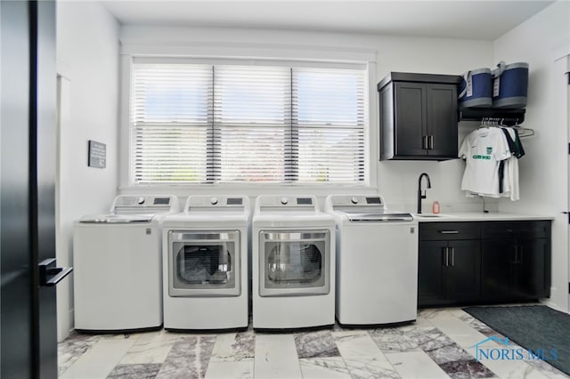 8440 E Woodland Trl, Findlay, OH 45840 - washroom with cabinet space, independent washer and dryer, and light marble finish floors
