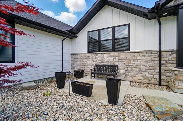 8440 E Woodland Trl, Findlay, OH 45840 - view of patio with a fire pit