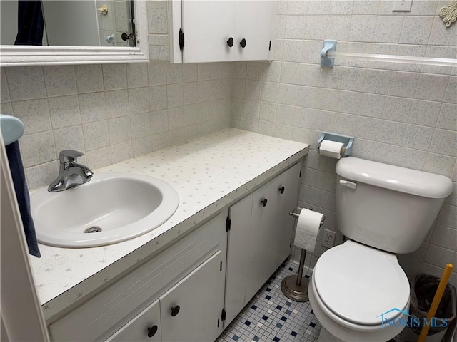 165 5th St, Mcclure, OH 43534 - bathroom with vanity, toilet, and tile patterned floors
