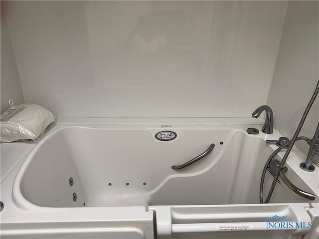 165 5th St, Mcclure, OH 43534 - full bathroom featuring a tub with jets