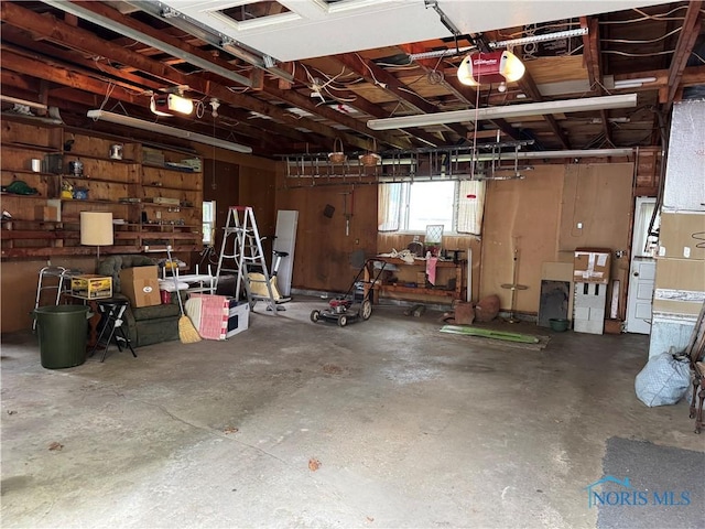 165 5th St, Mcclure, OH 43534 - garage with a garage door opener
