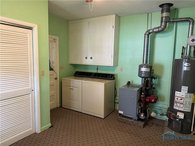 165 5th St, Mcclure, OH 43534 - laundry room featuring cabinet space, water heater, washer and clothes dryer, and a heating unit