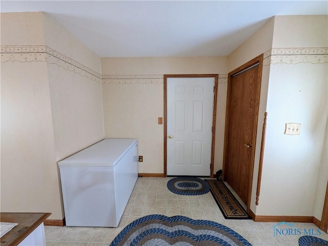 2450 N Billman Rd, Genoa, OH 43430 - washroom featuring light tile patterned flooring and baseboards