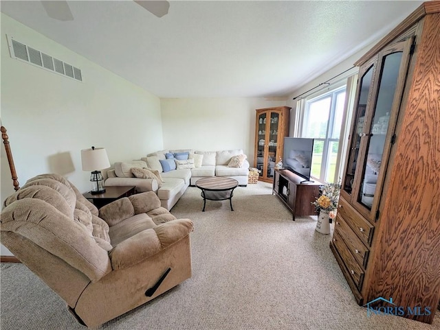 2450 N Billman Rd, Genoa, OH 43430 - living room featuring light colored carpet and a ceiling fan