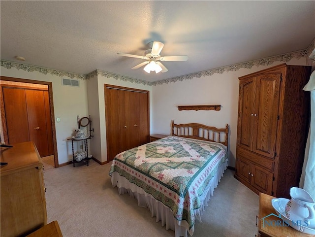 2450 N Billman Rd, Genoa, OH 43430 - bedroom featuring light carpet, a closet, ceiling fan, and baseboards