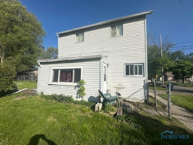 2111 Elm St, Toledo, OH 43608 - back of property featuring a gate
