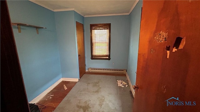 203 E Ash St, Continental, OH 45831 - interior space with baseboard heating, baseboards, and crown molding