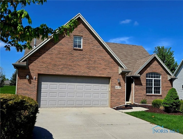 10770 Waterview Dr, Perrysburg, OH 43551 - traditional home featuring brick siding and driveway